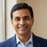 Indian man professional smiling portrait for patient testimonial