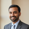 Indian male corporate professional smiling portrait for testimonial